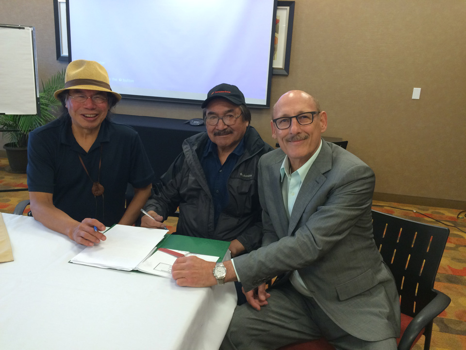 Geordi Kakepetum, CEO, NCC Development LP, Chief Joseph Crowe of Fort Severn First Nation near Hudson Bay and David Arenburg, Senior Advisor, Canadian Solar inking an agreement to install 300 kW solar / 300 kW storage with a controller solution